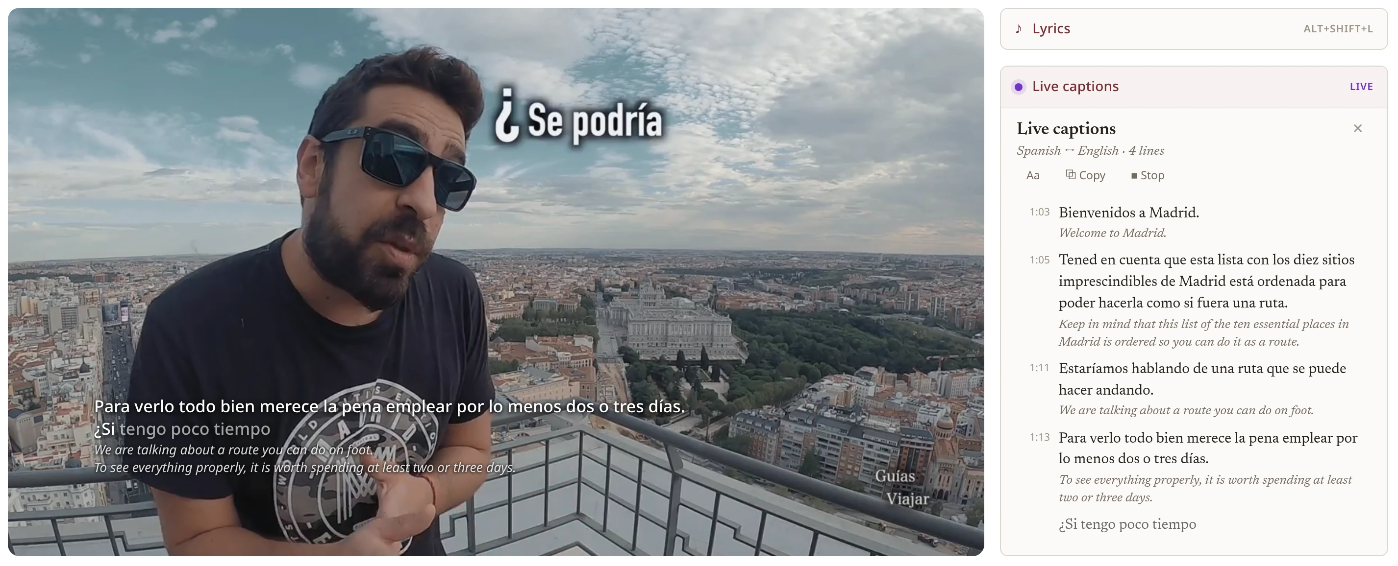 Live captions on a video, the spoken line above and the translation beneath, the transcript beside